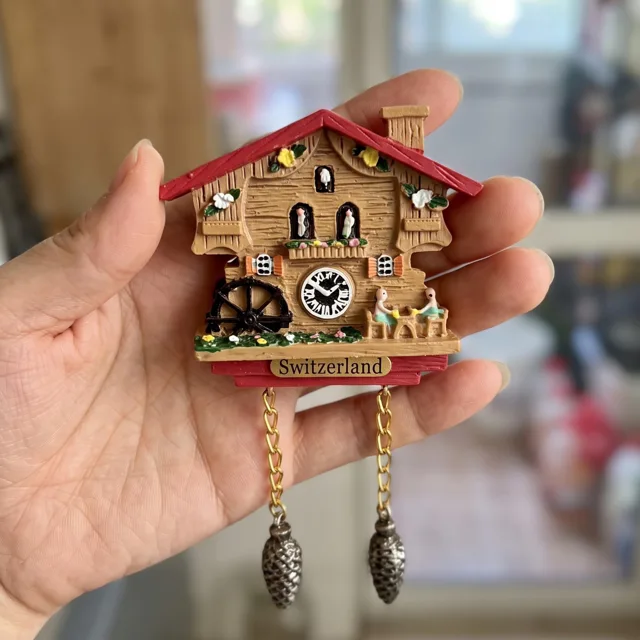 Cuckoo Clock Fridge Magnet: 3D Resin Chalet Souvenir With Hanging Cones — product photo 1