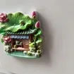 Refrigerator Magnet: Frog Cottage With Leaf Roof and Pink Flowers — product photo 2